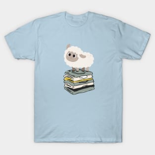 Cute Baby Sheep on top of folded clothes T-Shirt